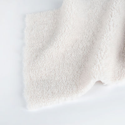 Winterjas met gebreide kleding en een Teddy Sherpa-valse bont