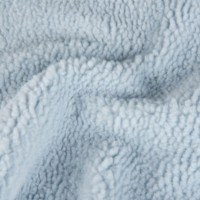Winterjas met gebreide kleding en een Teddy Sherpa-valse bont